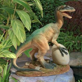 THE EGG BEATER RAPTOR DINOSAUR STATUE